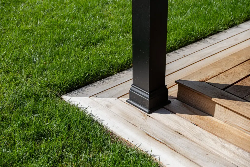 Close-up of a StruXure pergola's structural post base detailing in Saratoga, CA